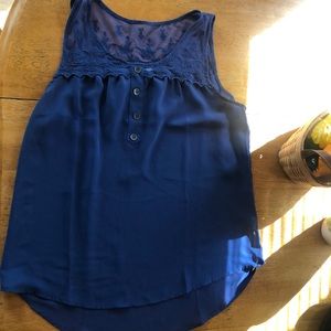 Blue sheer shirt with lace and button features
